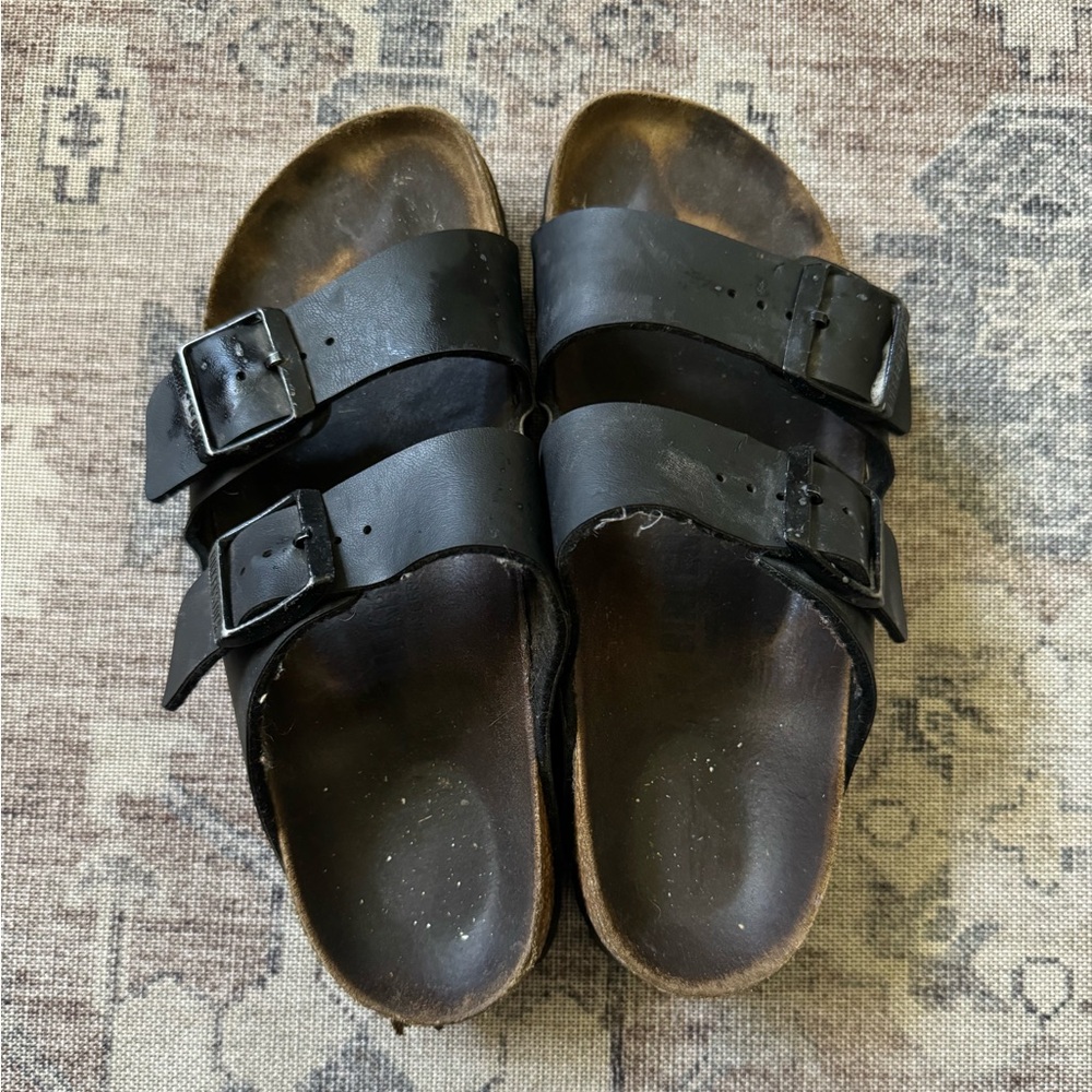 Worn black birkenstocks